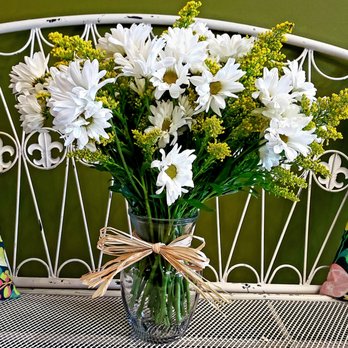 Flowers & Chocolate - a vase of daisies on a table - Florists Near Me - Howell, New Jersey Flowers & Chocolate - a vase of daisies on a table - Florists Near Me - Howell, New Jersey