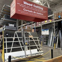 Lowe's Home Improvement - If you need wood or shelving cut. Lowes will do it for you at no charge.