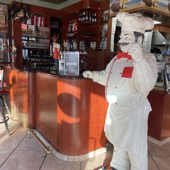 Casanova Restaurant - a statue of a chef at the bar - Italian Near Me - Brooklyn, New York