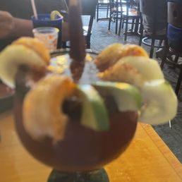 a bloody drink with donuts