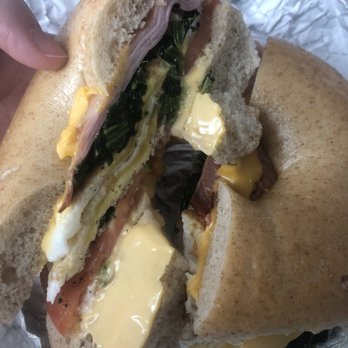 Wally's Bagels - Ham egg and cheese with spinach and tomato on a whole wheat bagel - Bagels Near Me - North Babylon, New York Wally's Bagels - Ham egg and cheese with spinach and tomato on a whole wheat bagel - Bagels Near Me - North Babylon, New York