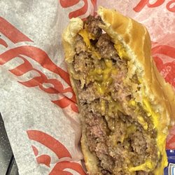 Freddy's Frozen Custard & Steakburgers - Notice the red undercooked portions of the burgers.  When I squeezed them, the juices ran bloody.