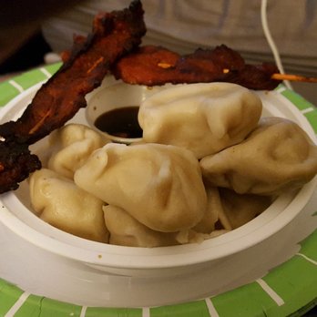 Xin's Chinese Restaurant - Pork Dumplings steamed/boiled - Tender and delicious. The dipping sauce has thinly sliced scallion that enhances its favor. - Chinese Near Me - Nutley, New Jersey Xin's Chinese Restaurant - Pork Dumplings steamed/boiled - Tender and delicious. The dipping sauce has thinly sliced scallion that enhances its favor. - Chinese Near Me - Nutley, New Jersey
