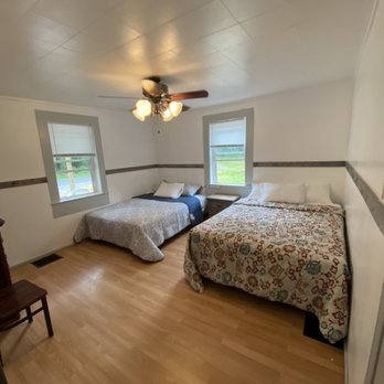 Miner's Inn - Bedroom #1 with two queen beds! - Vacation Rentals Near Me - Rock, West Virginia Miner's Inn - Bedroom #1 with two queen beds! - Vacation Rentals Near Me - Rock, West Virginia