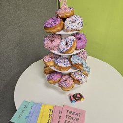 DK's Donuts - 2 dozen custom order, both the glaze and the sprinkles were custom requests