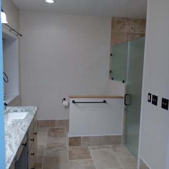TNR Cleancare - a bathroom with a shower and sink - Handyman Near Me - Middletown, Ohio TNR Cleancare - a bathroom with a shower and sink - Handyman Near Me - Middletown, Ohio