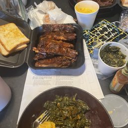 Ribs with the spicy sauce, mac n cheese, collard greens, and their (whole) chicken. Ribs with the spicy sauce, mac n cheese, collard greens, and their (whole) chicken.
