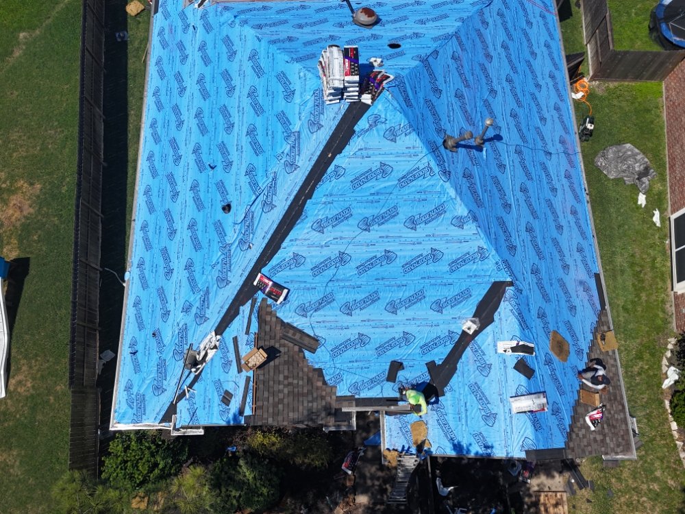 Slide of The Roofing Consultants