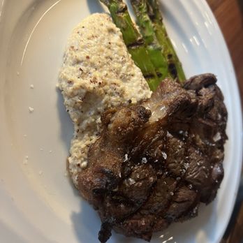 Jesse's On the Bay - Tough Ribeye with delicious grits! - Steakhouses Near Me - Gulf Shores, Alabama