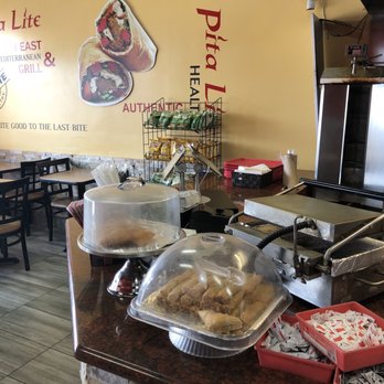 Pita Lite - a counter with a variety of food items - Mediterranean Near Me - Brampton, Ontario