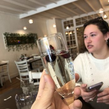 The Flying Egg - a woman holding a glass of wine - Breakfast & Brunch Near Me - Bethlehem, Pennsylvania The Flying Egg - a woman holding a glass of wine - Breakfast & Brunch Near Me - Bethlehem, Pennsylvania