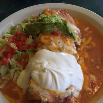 Las Palmas - Chicken chimichanga with avocado, lettuce, tomato, and sour cream. - Mexican Near Me - Thornton, Colorado Las Palmas - Chicken chimichanga with avocado, lettuce, tomato, and sour cream. - Mexican Near Me - Thornton, Colorado