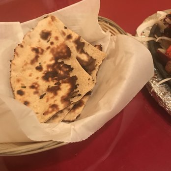 Our Place - Tandoori roti which is served along with main course - Indian Near Me - Irving, Texas Our Place - Tandoori roti which is served along with main course - Indian Near Me - Irving, Texas