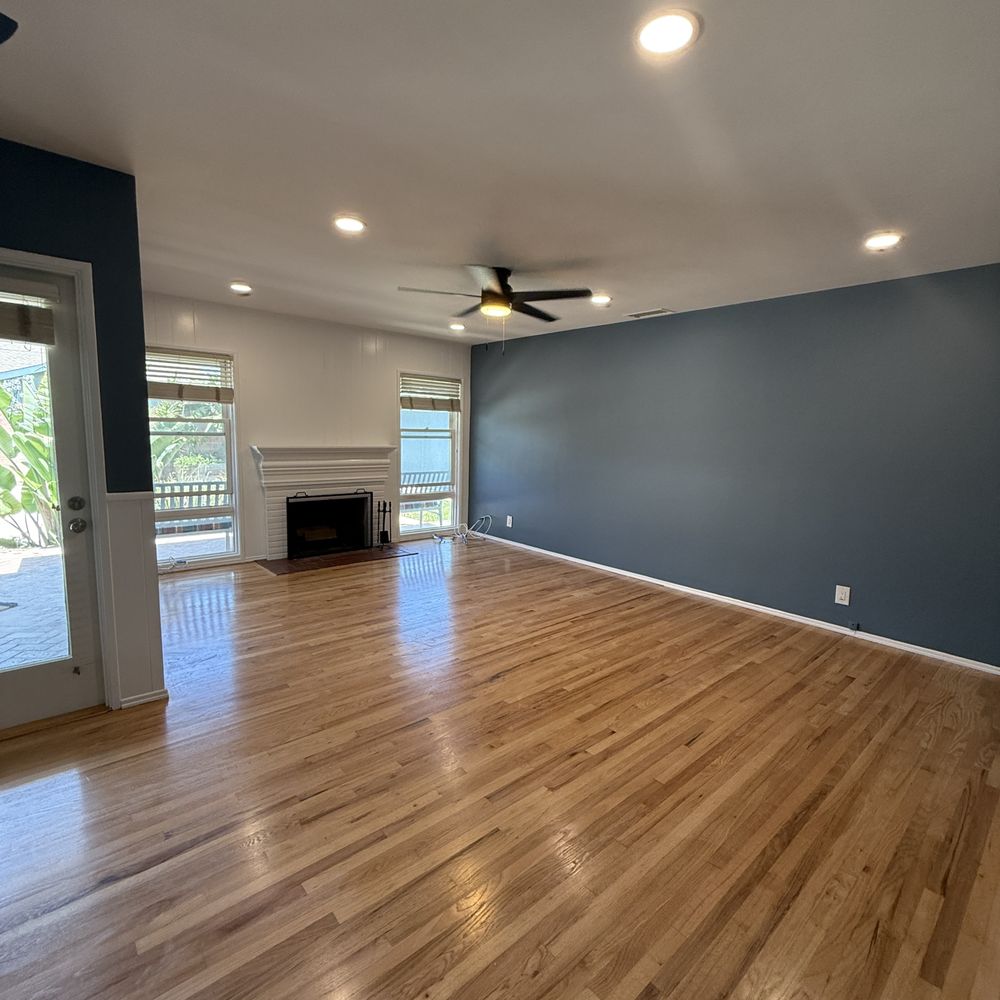 Living room floor refinished with no stain. Living room floor refinished with no stain.