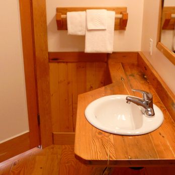 Seine Boat Inn - Re-purposed Fir Planking and Driftwood provide warmth and character throughout the Inn. - Hotels Near Me - Alert Bay, British Columbia Seine Boat Inn - Re-purposed Fir Planking and Driftwood provide warmth and character throughout the Inn. - Hotels Near Me - Alert Bay, British Columbia