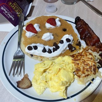 IHOP - My kids happy face pancakes, added some of my own hashbrowns. - Breakfast & Brunch Near Me - BAKERSFIELD, California