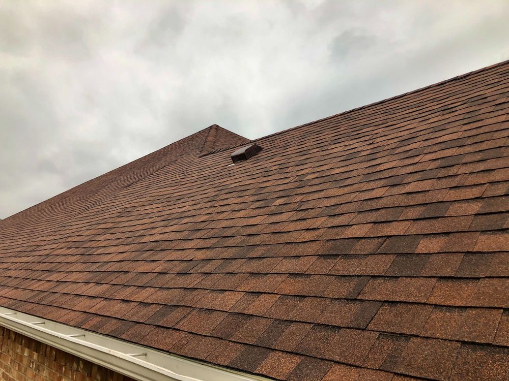 Slide of Birdcreek Roofing