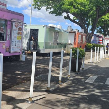 Dick's Lechon - Food truck row, with only Dick's Lechon and Leonard's Malasada trucks were open just before 11am on a Friday. - Filipino Near Me - Waipahu, Hawaii
