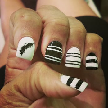 Envy Nail Spa - Black and white nails with a cute feather design. - Nail Salons Near Me - Egg Harbor Township, New Jersey Envy Nail Spa - Black and white nails with a cute feather design. - Nail Salons Near Me - Egg Harbor Township, New Jersey