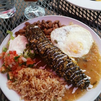Adobe Bar - Chile relleno with an egg & vegetarian green chile, huevos rancheros & Bloody Marys from Adobe Bar/Taos Inn - Bars Near Me - Taos, New Mexico