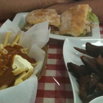 Carolina Kitchen - Turkey Hoagie, covered fries and wings - American Near Me Carolina Kitchen - Turkey Hoagie, covered fries and wings - American Near Me
