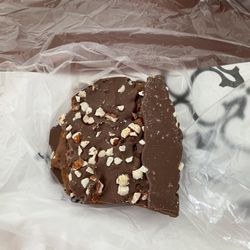 Kilwins - Toffee almond crunch $32.99 a lbs this piece was about $5