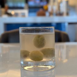Terminal F - Atlanta Airport - Thank you to bartender Brian Crump for this extra dirty martini at the Delta Sky Club at Hartsfield Concourse F. Tip your bartenders.