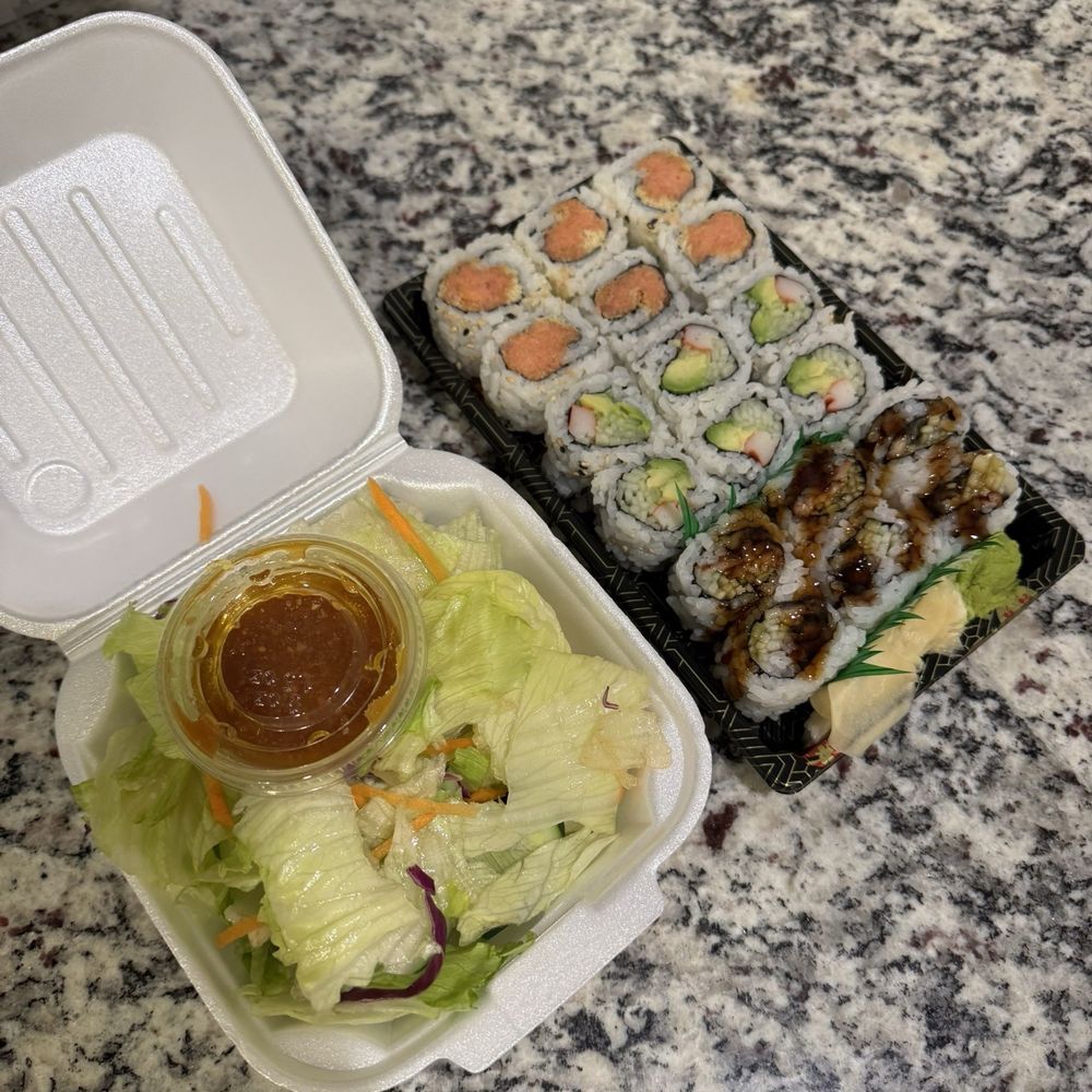 Sushi & Sashimi Combo A (California roll, eel roll, and a spicy tuna roll) with a ginger salad Sushi & Sashimi Combo A (California roll, eel roll, and a spicy tuna roll) with a ginger salad