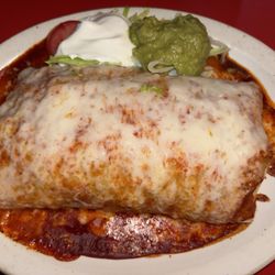 Angel's Rock House - Chiles Rellenos burrito with added carnitas enchilada style.