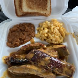 Rib dinner with Mac and cheese and baked beans
