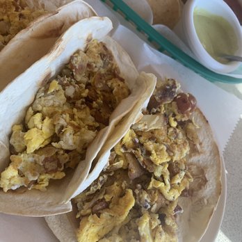 Taqueria Rincon De Jalisco - two tacos filled with eggs and beans - Mexican Near Me - Houston, Texas Taqueria Rincon De Jalisco - two tacos filled with eggs and beans - Mexican Near Me - Houston, Texas