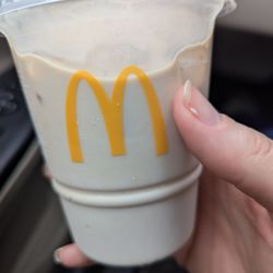 McDonald's - This is an iced "coffee" with 1 cream -- at least, that's what I ordered. And then I get a cup of cream. Seriously. Disgusting.