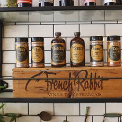 Smokin J's BBQ & Taphouse - House-made sauce, ketchup, and rubs.