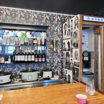 Ravish Liquors - a bar with a wallpapered wall - Bars Near Me - Coxsackie, New York Ravish Liquors - a bar with a wallpapered wall - Bars Near Me - Coxsackie, New York