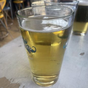 Fishbones - A cold Stella - New American Near Me - Greensboro, North Carolina