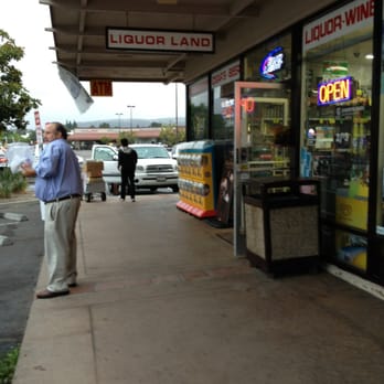 Liquor Land - a man talking on a cell phone - Beer, Wine & Spirits Near Me - San Diego, California Liquor Land - a man talking on a cell phone - Beer, Wine & Spirits Near Me - San Diego, California