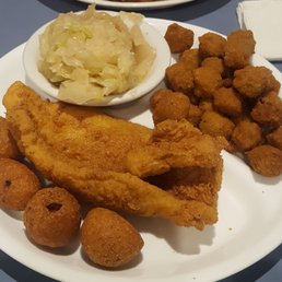 Catfish, okra and cabbage. Ignore (don't order) the hushpuppies. Catfish, okra and cabbage. Ignore (don't order) the hushpuppies.