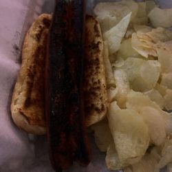 Grilled hotdog on buttery bun