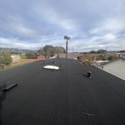 Diaz Roofing Company - Torch down for our low pitch roof.