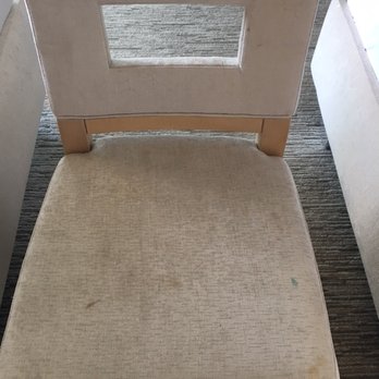 Grand Beach Hotel Surfside - Filthy chair in our suite that cost $700 per night. - Hotels Near Me - Surfside, Florida