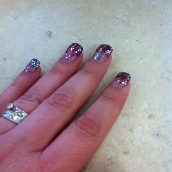 Creative Nails - Kelly used a dark purple glitter acrylic and spread it upwards then used the Skyfall glitter on top. - Nail Salons Near Me - Salinas, California Creative Nails - Kelly used a dark purple glitter acrylic and spread it upwards then used the Skyfall glitter on top. - Nail Salons Near Me - Salinas, California