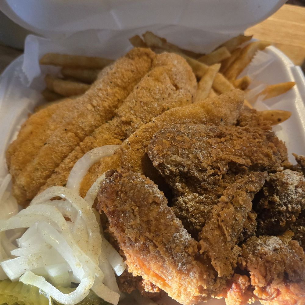 Fire Grill - Fish and wings comes with fries, bread, pickles and onions - Burgers Near Me - Lemay, Missouri