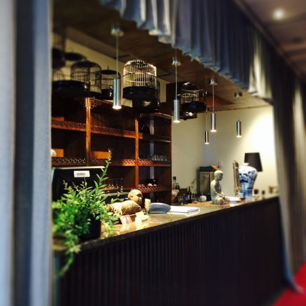 Spring Trees Restaurant - Front counter with hanging cages and drapery - Szechuan Near Me - Auckland, AUK