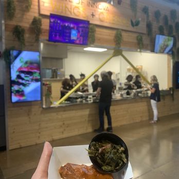 The AMP - Taste of Innova - curry wing and collard greens with smoked turkey - Public Markets Near Me - Indianapolis, Indiana The AMP - Taste of Innova - curry wing and collard greens with smoked turkey - Public Markets Near Me - Indianapolis, Indiana