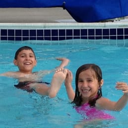 Kids enjoying the heated outdoor pool Kids enjoying the heated outdoor pool
