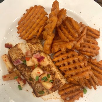 Saltwater Grill - Blackened Mahi Mahi with Sweet Potato Fries - Seafood Near Me - New Bern, North Carolina Saltwater Grill - Blackened Mahi Mahi with Sweet Potato Fries - Seafood Near Me - New Bern, North Carolina