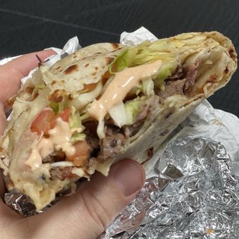 The Taco Stand - Mar y Tierra burrito, but like, partially devoured before I remembered I should take a photo. Really good. - Mexican Near Me - Costa Mesa, California