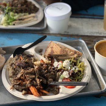 Rodini Park - Lentil soup, mount Olympus sauce, lamb shawarma, brown rice, fries mix, wheat pita - Greek Near Me - Playa Vista, California Rodini Park - Lentil soup, mount Olympus sauce, lamb shawarma, brown rice, fries mix, wheat pita - Greek Near Me - Playa Vista, California