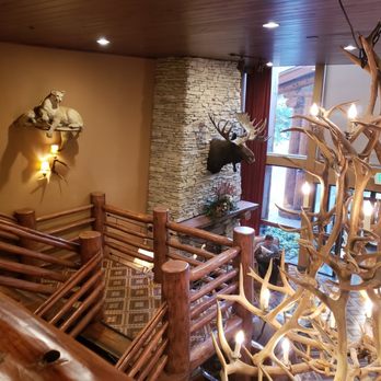 The Lodge at Jackson Hole - Lobby from the second floor. Pretty, western decor with a fireplace. - Hotels Near Me - Jackson, Wyoming The Lodge at Jackson Hole - Lobby from the second floor. Pretty, western decor with a fireplace. - Hotels Near Me - Jackson, Wyoming