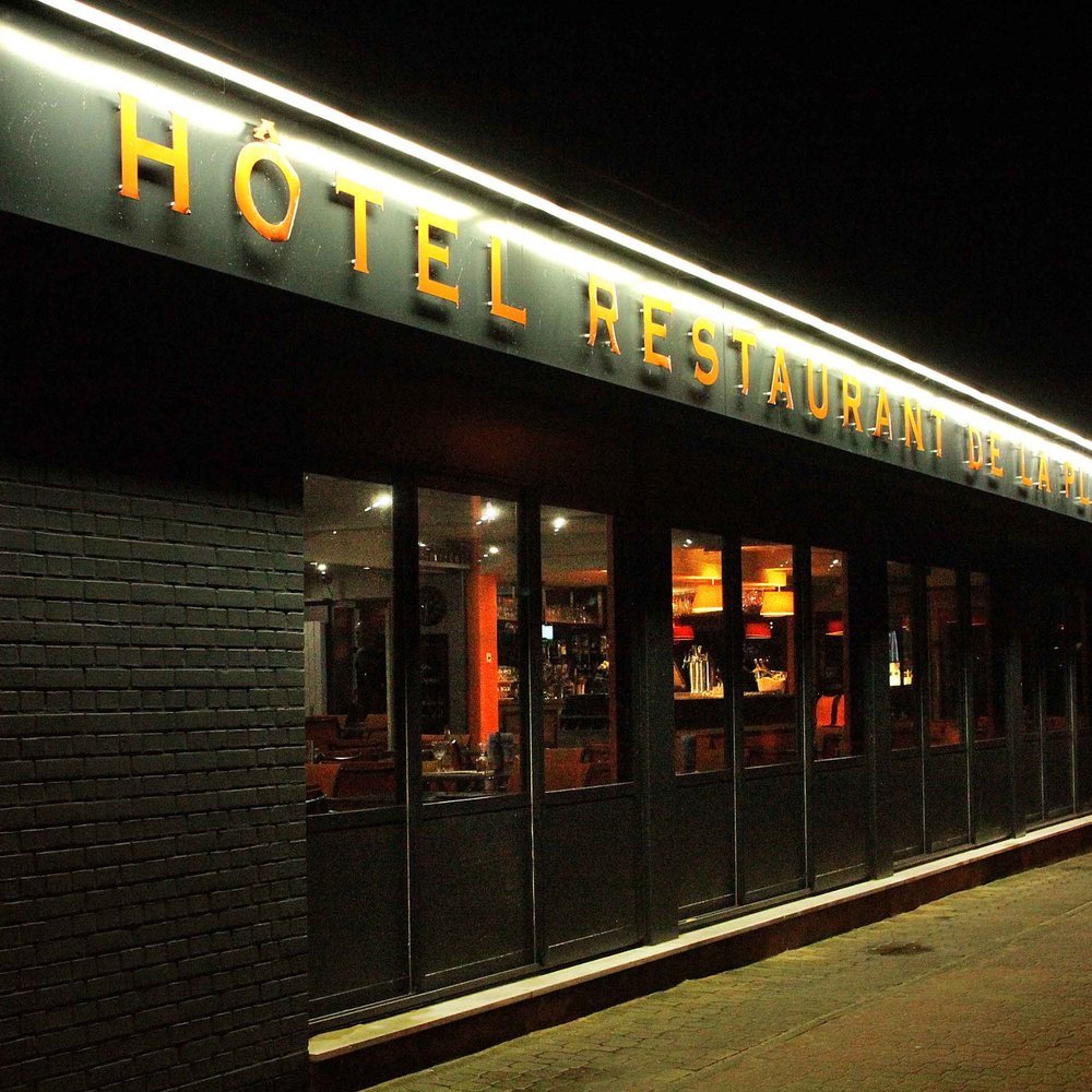 Hotel de la Plage - hotel front (reception area and dining hall), viewed from outside, photo taken at night - Hotels Near Me - Calais, 62